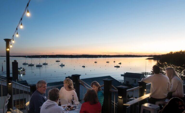 End of sunset outdoor dining at Pepperell Cove
